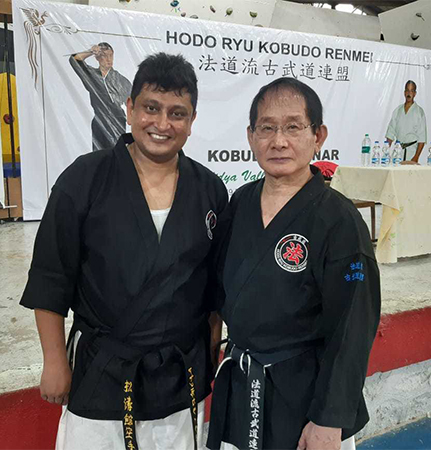 Shihan Ayan Chakraborty with Hanshi Katsutaka Tanaka 9th Dan from Japan