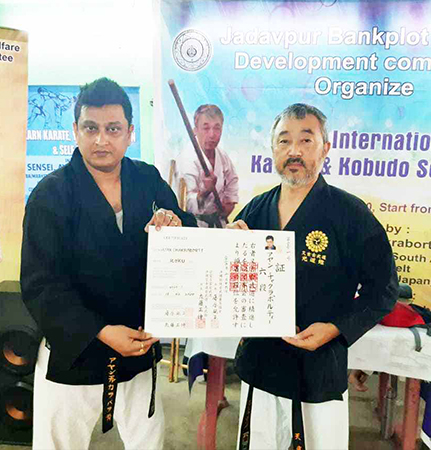 Shihan Ayan Chakraborty with Hanshi Eric Govender 8th Dan from South Africa